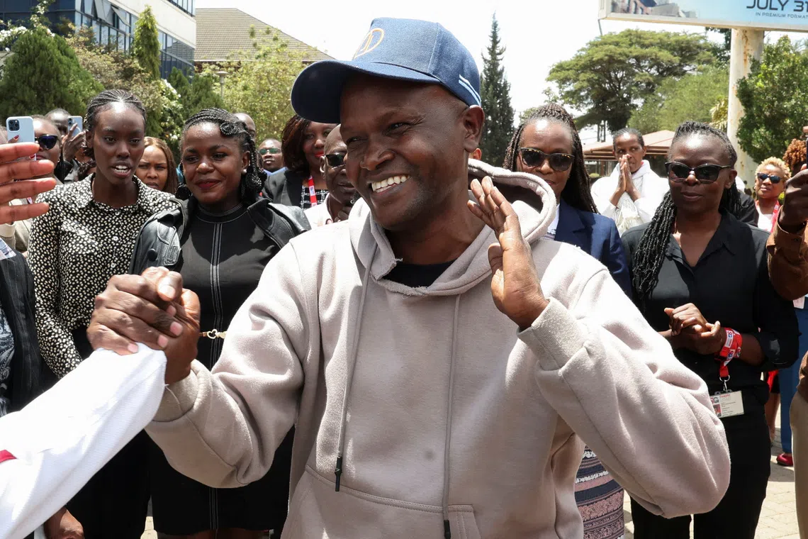 Alex Kiprotich, an associate editor for Standard Group, who was abducted by armed men and released hours later, is welcomed by his colleagues before a press conference on his abduction, at the Standard Group offices in Nairobi, Kenya, September 2, 2026. REUTERS/Monicah Mwangi