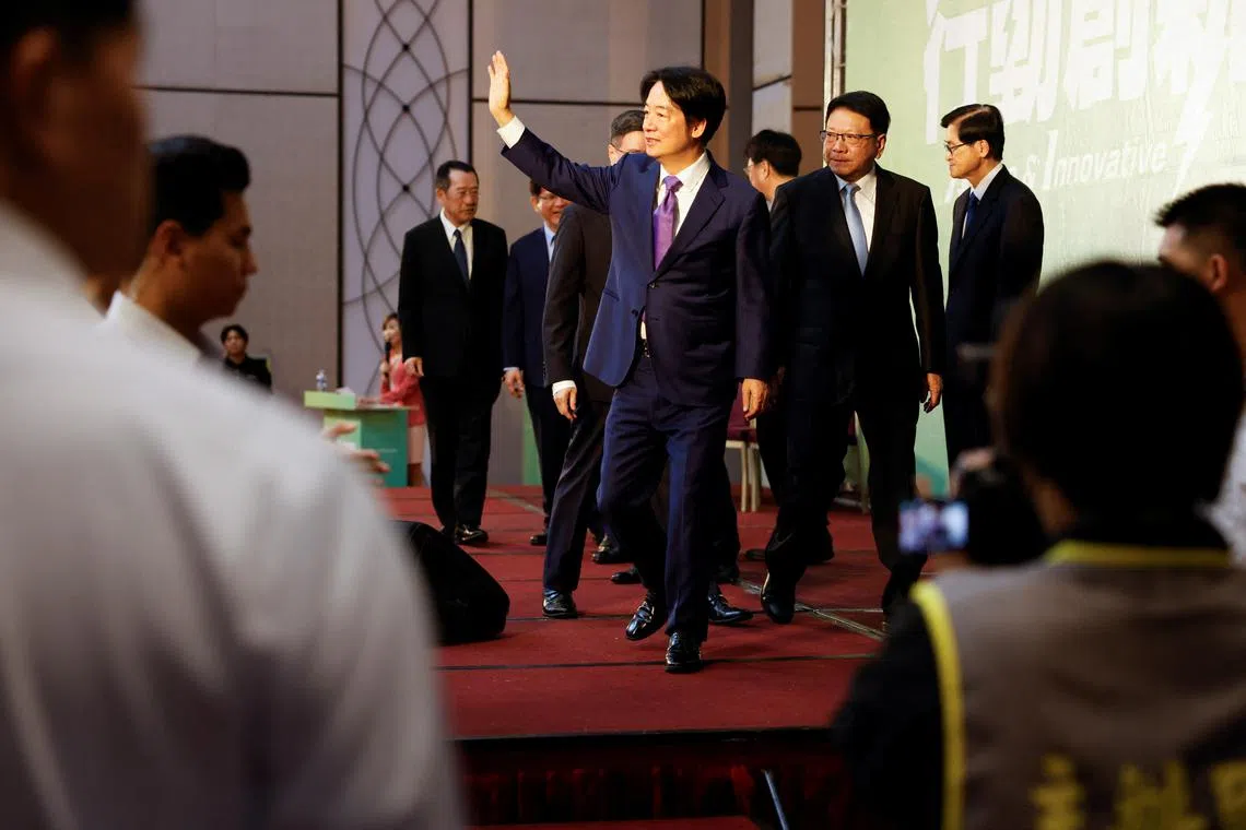 Taiwan President-elect Lai Ching-te speaks waves during a press conference where incoming cabinet members are announced, in Taipei, Taiwan April 25, 2024. REUTERS/Carlos Garcia Rawlins