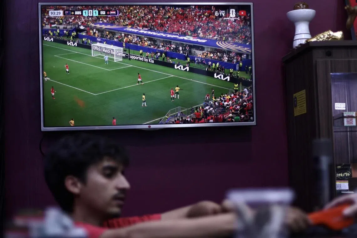 A TV screen showing a World Cup 2026 match on CazeTV, a Brazilian YouTube channel, in Sao Paulo, on July 3.
