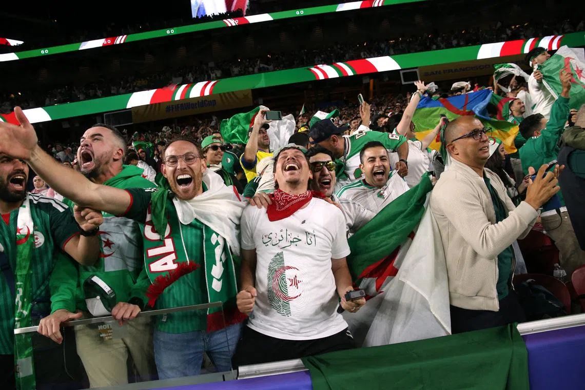 Soccer Football - FIFA World Cup 2026 - Group J - Jordan v Algeria - San Francisco Bay Area Stadium, Santa Clara, California, U.S. - June 22, 2026 Algeria fans celebrate in the stands after Amine Gouiri scores their second goal IMAGN IMAGES via Reuters/David Gonzales