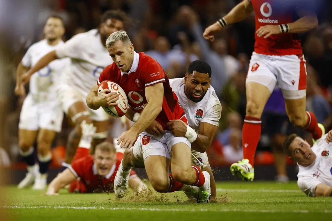 Wales' Gareth Davies scoring their first try against England in a 20-9 win in Cardiff.