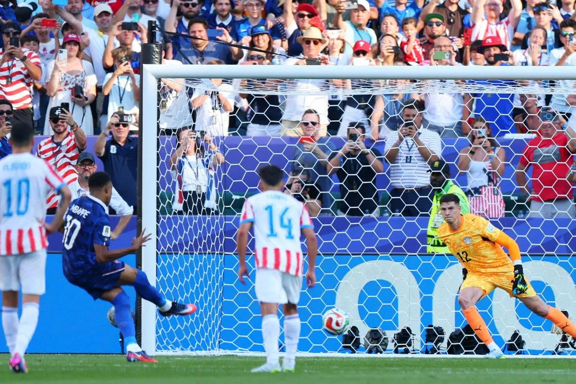 Soccer Football - FIFA World Cup 2026 - Round of 16 - Paraguay v France - Philadelphia Stadium, Philadelphia, Pennsylvania, U.S. - July 4, 2026  France's Kylian Mbappe scores their first goal from the penalty spot REUTERS/Mike Segar