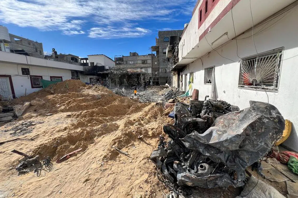 Rubble lies next to a building following an Israeli raid at Kamal Adwan hospital, amid the ongoing conflict between Israel and Palestinian Islamist group Hamas, in the northern Gaza Strip December 16, 2023. REUTERS/Fadi Alwhidifa/File Photo