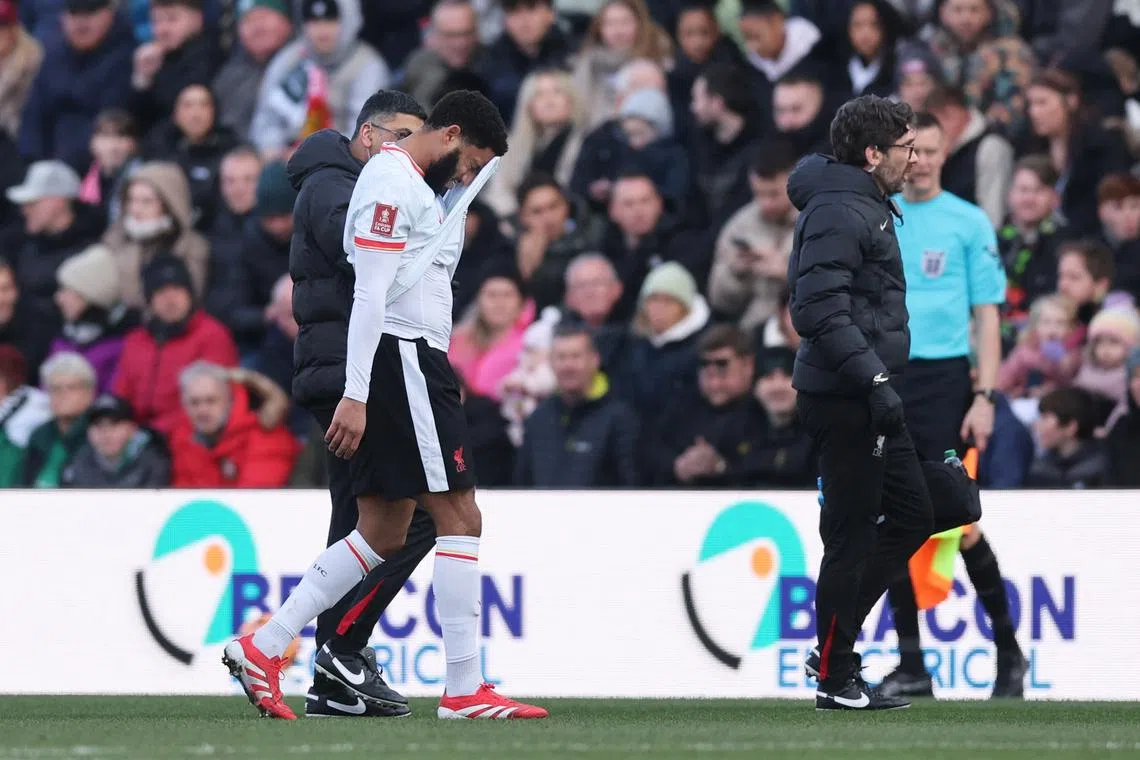 FILE PHOTO: Soccer Football - FA Cup - Fourth Round - Plymouth Argyle v Liverpool - Home Park, Plymouth, Britain - February 9, 2025 Liverpool's Joe Gomez walks off the pitch after sustaining an injury REUTERS/David Klein/File Photo