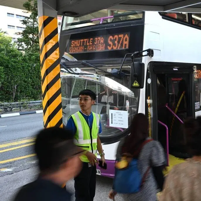 Commuters queuing up to take the shuttle bus service 37A at Serangoon MRT station on Jan 13. 44 double-decker buses will be deployed across four shuttle services.
