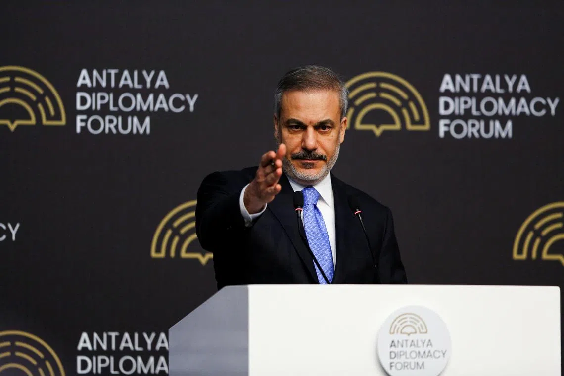 FILE PHOTO: Turkish Foreign Minister Hakan Fidan gestures as he speaks during a press conference at Antalya Diplomacy Forum in Antalya, Turkey, April 13, 2025. REUTERS/Kaan Soyturk/File Photo