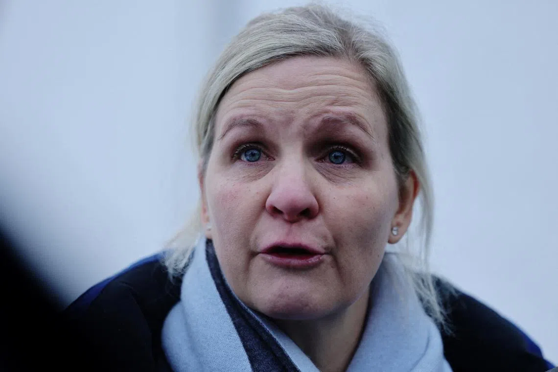 Milano Cortina 2026 Olympics - Skeleton - IOC President Kirsty Coventry meets skeleton racer Vladyslav Heraskevych of Ukraine - Cortina Sliding Centre, Cortina d'Ampezzo, Italy - February 12, 2026. IOC President Kirsty Coventry speaks to the media and reacts after her scheduled meeting with skeleton racer Vladyslav Heraskevych of Ukraine following his disqualification after wearing a helmet in tribute to athletes who have died amid Russia's attack on Ukraine REUTERS/Athit Perawongmetha