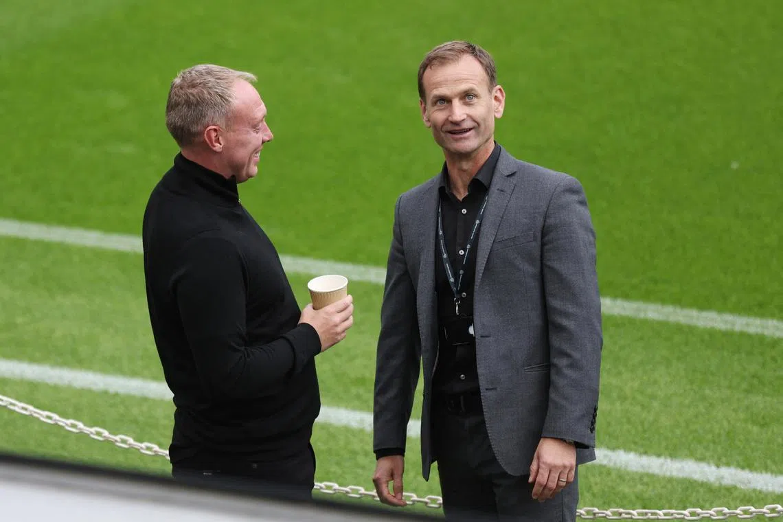 FILE PHOTO: Soccer Football - Premier League - Newcastle United v Nottingham Forest - St James' Park, Newcastle, Britain - August 6, 2022 Newcastle United sporting director Dan Ashworth with Nottingham Forest manager Steve Cooper before the match Action Images via Reuters/Lee Smith/File Photo