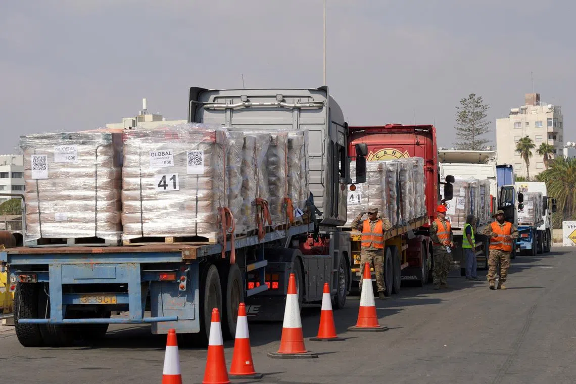 Lorries with aid loads for delivery into Gaza arrive at Larnaca Port, Cyprus, June 26, 2024. REUTERS/Marinos Meletiou