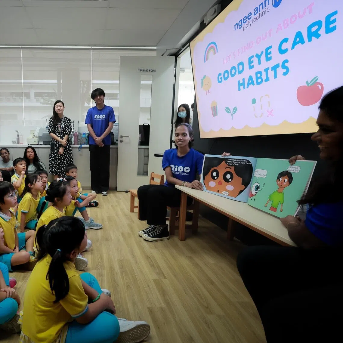 Children watching a show on good eye-care habits. The newly established Myopia Society of Singapore has urged parents to be aware of myopia developing in their children.