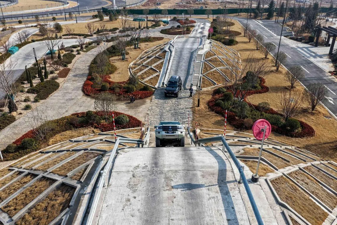 BYD wows with showcase of motoring technology in all-terrain circuit and museum in Zhengzhou