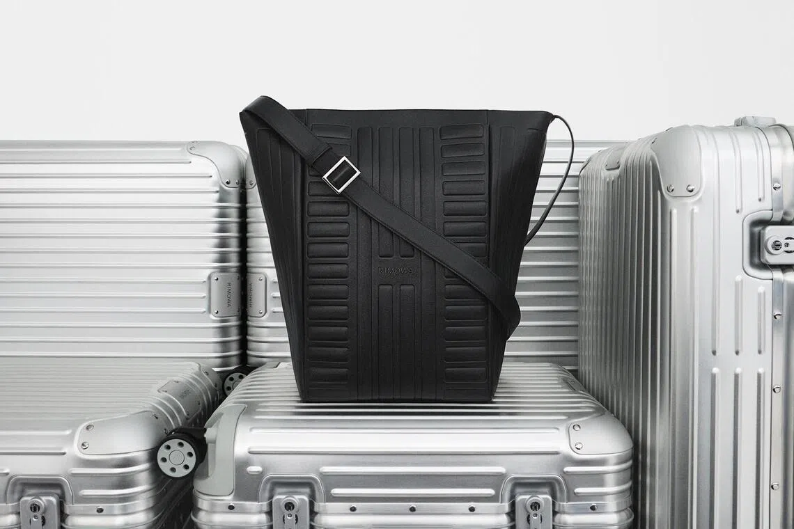 Rimowa's new hobo bag ($2,700) has a relaxed broad top that can fit a 13-inch laptop and an adjustable strap.