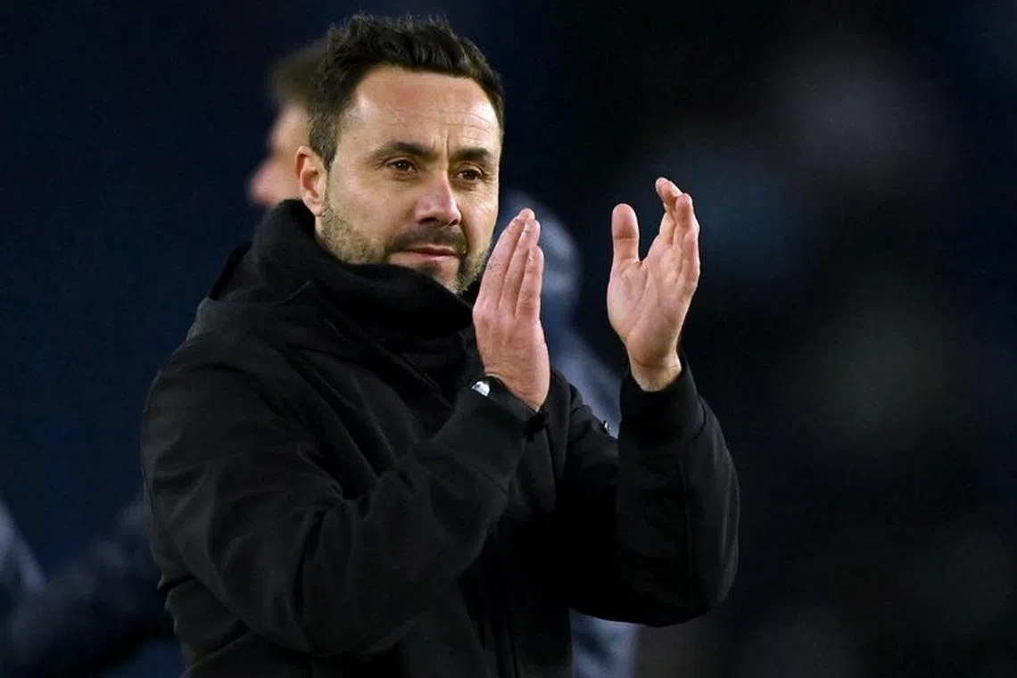 Soccer Football - Premier League - Brighton & Hove Albion v Tottenham Hotspur - The American Express Community Stadium, Brighton, Britain - December 28, 2023 Brighton & Hove Albion manager Roberto De Zerbi celebrates after the match REUTERS/Dylan Martinez/ File photo