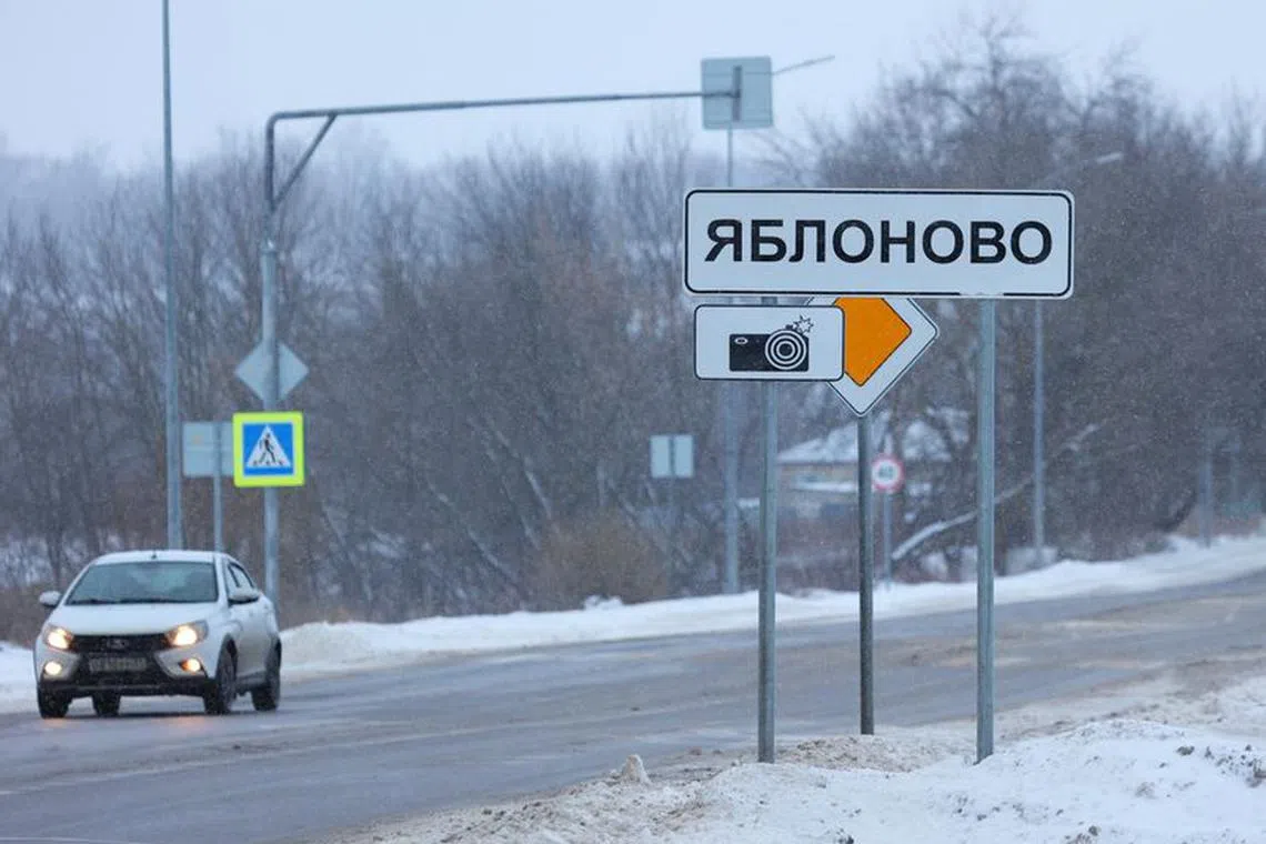 A view shows a road sign with the name of Yablonovo village near the crash site of the Russian Ilyushin Il-76 military transport plane in the Belgorod Region, Russia January 24, 2024. REUTERS/Stringer
