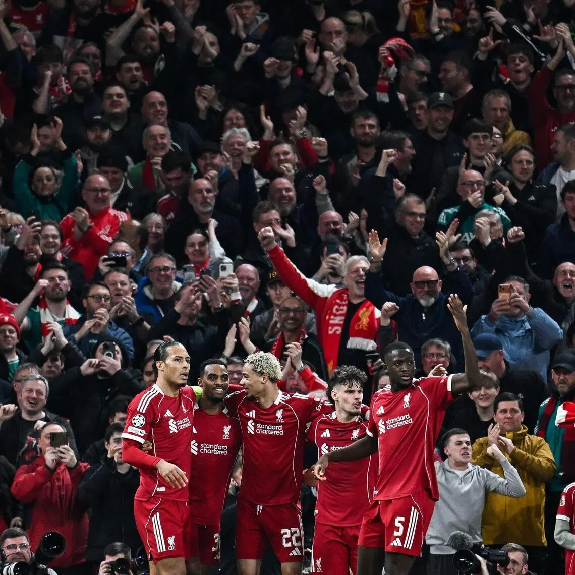 Liverpool players celebrate after scoring against Galatasaray in the Champions League last 16.