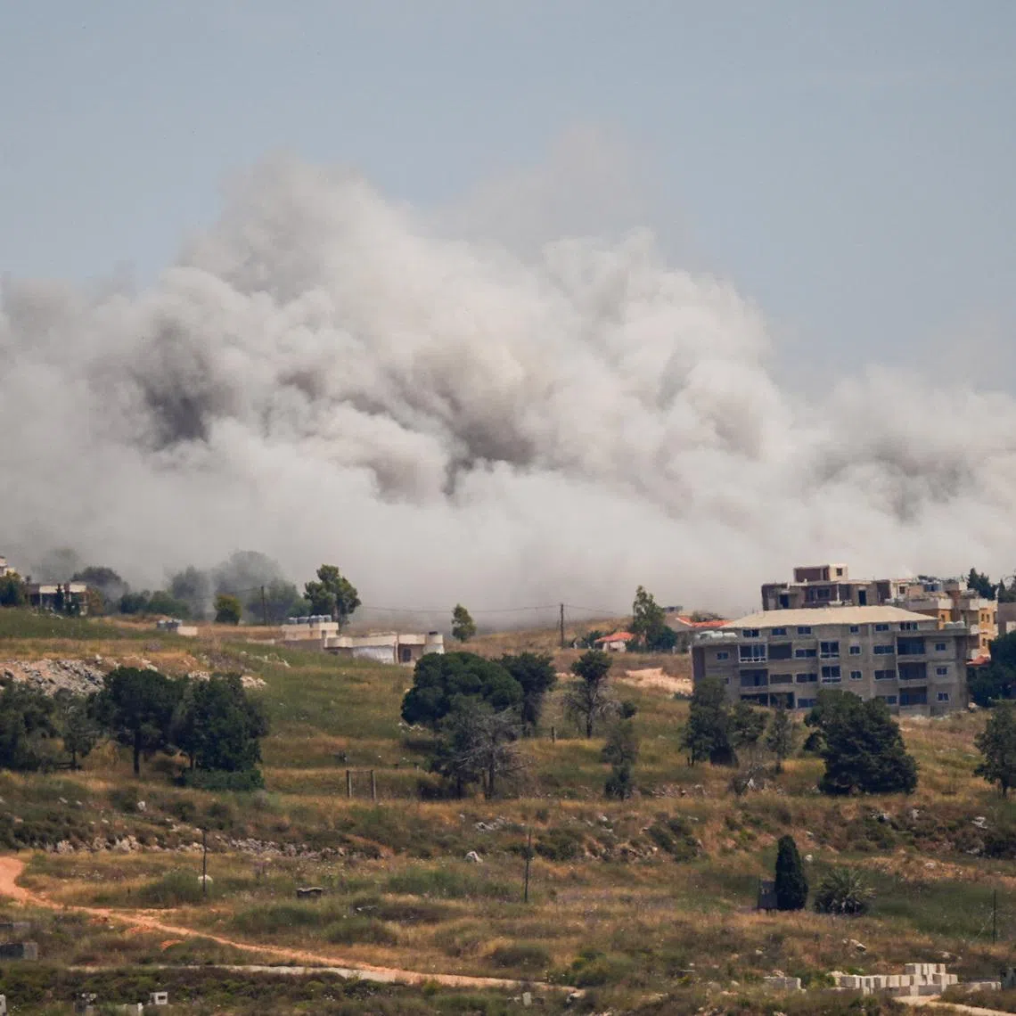 Smoke billows from southern Lebanon, following Israeli strikes, as seen from Nabatieh, Lebanon, June 3, 2026. REUTERS/Stringer