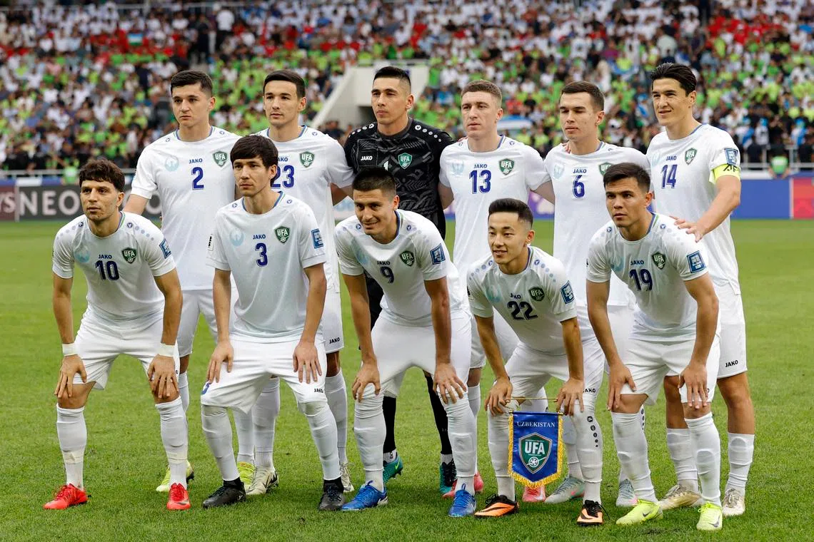 Soccer Football - World Cup - AFC Qualifiers - Group A - Uzbekistan v Qatar - Milliy Stadium, Tashkent, Uzbekistan - June 10, 2025 Uzbekistan players pose for a team group photo before the match REUTERS/Maxim Shemetov