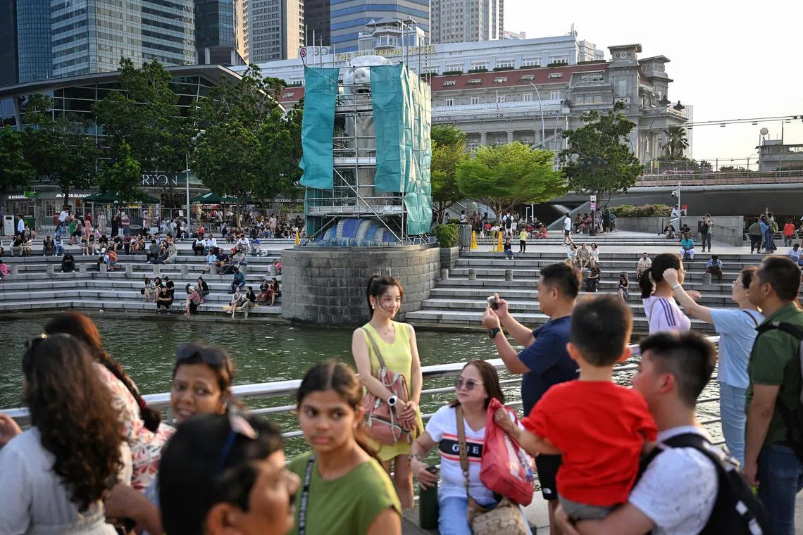 Tourists continued to flock to Merlion Park to snap pictures with the statue even though it was covered in scaffolding on July 27, 2023. The Merlion statue is closed for two days for maintenance to be carried out until Friday. The Singapore Tourism Board said in a statement: “While these works are in progress, the main Merlion statue will be covered in scaffolding and will not be available for photo-taking. 