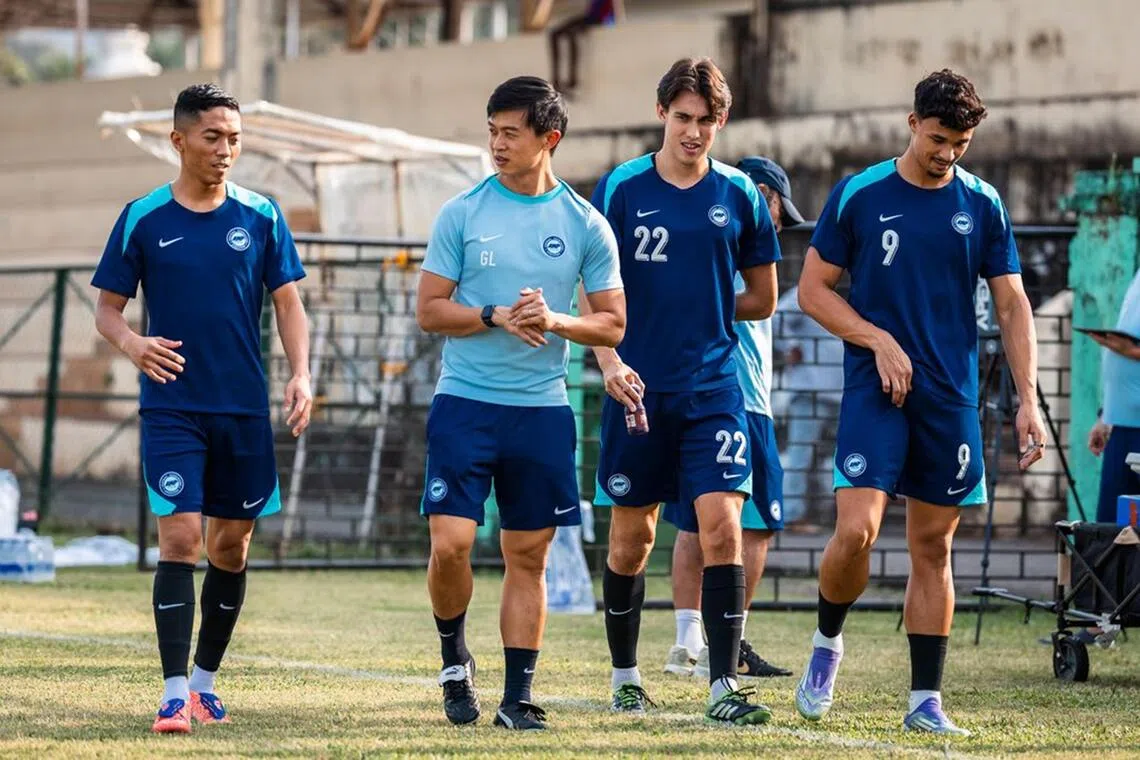 (from left) Lions striker Shawal Anuar, interim head coach Gavin Lee, midfielder Jacob Mahler and striker Ikhsan Fandi  training ahead of their Asian Cup qualifier against India.