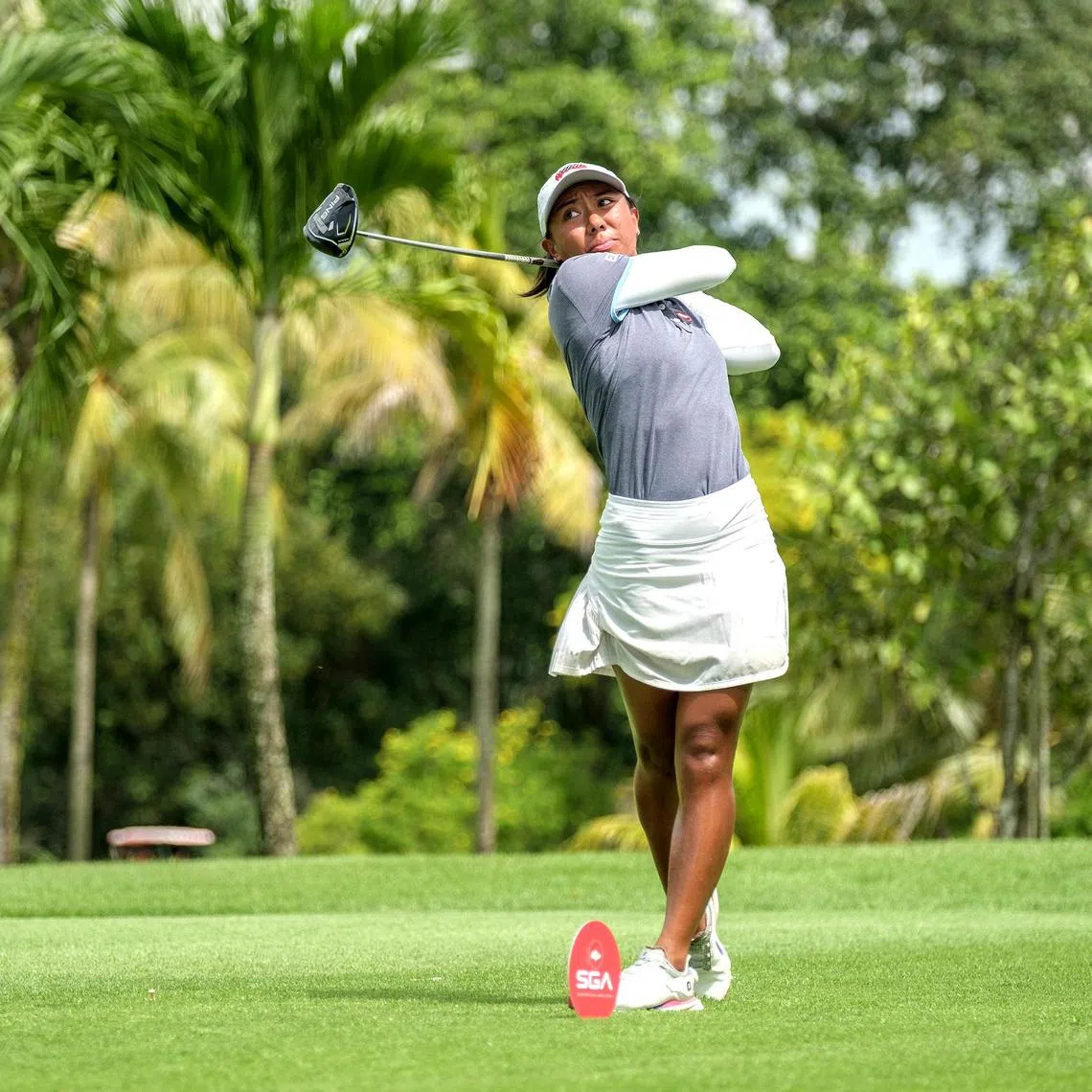 Singapore's Aloysa Atienza, 25, is in solo second and one shot behind Thailand's Pimpisa Rubrong in the women's Santi Cup.