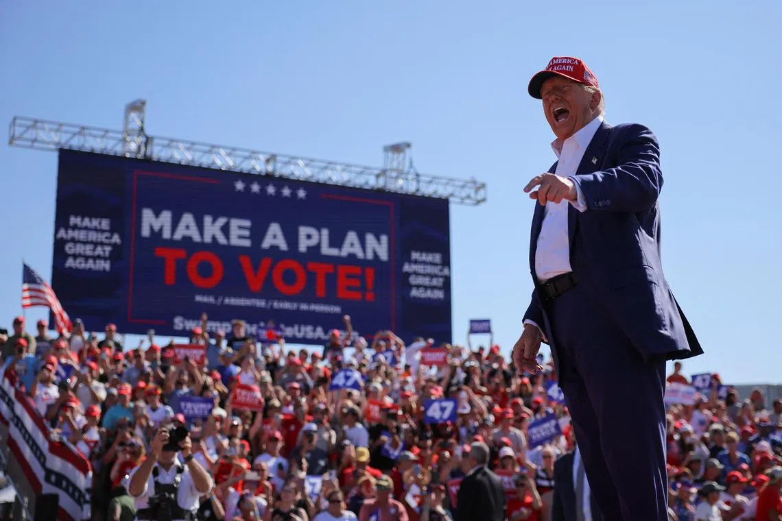 Republican presidential nominee and former US President Donald Trump addresses supporters at a campaign rally in Wilmington, North Carolina, US, on Sept 21.
