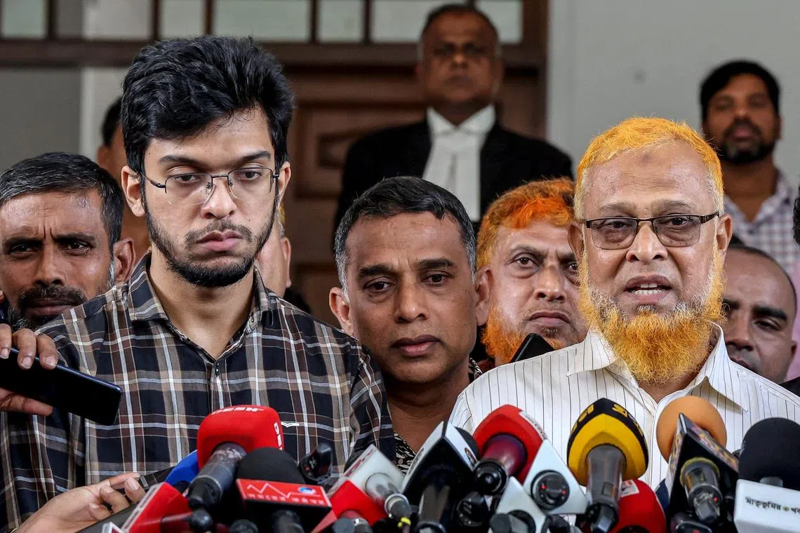 Mr Barkat Ullah (right), father of murdered student Abrar Fahad, speaks at a news conference in Dhaka.