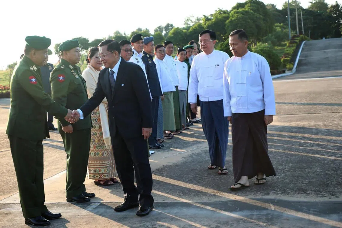 epa11701934 A handout photo made available by the Myanmar military information team shows military chief Senior General Min Aung Hlaing (3-L) greeting a member of his cabinet as he departs for a trip to China from Naypyitaw military airport, Naypyitaw, Myanmar, 05 November 2024. Hlaing will attend the summits of the 8th Greater Mekong Subregion (GMS), the 10th Ayeyawady-Chao Phraya-Mekong Economic Cooperation Strategy (ACMECS), and the 11th Cambodia-Lao PRD-Myanmar-Vietnam (CLMV), in Kunming, China between 06 and 07 November 2024.  EPA-EFE/Myanmar military information team HANDOUT EDITORIAL USE ONLY/NO SALES