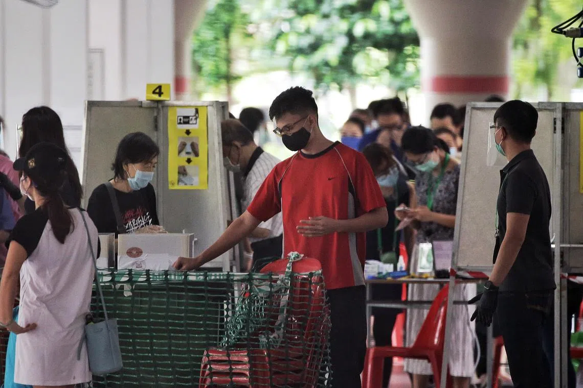 Voters at a polling station in Pasir Ron July 10, 2020. [General Election 2020]