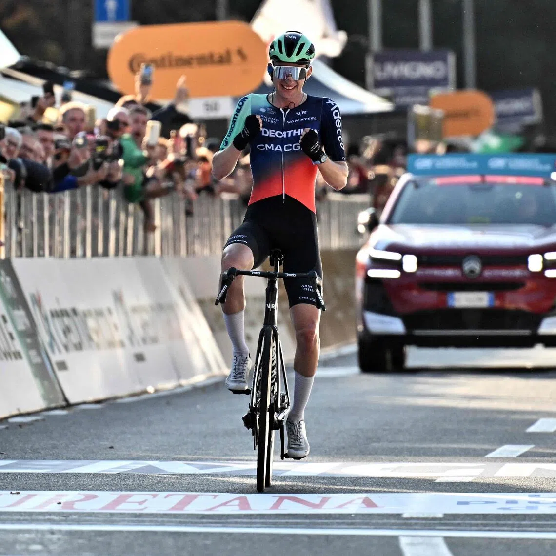 Paul Seixas celebrating after winning the 120th edition of the Giro di Lombardia between Bergamo and Como on Oct 10.