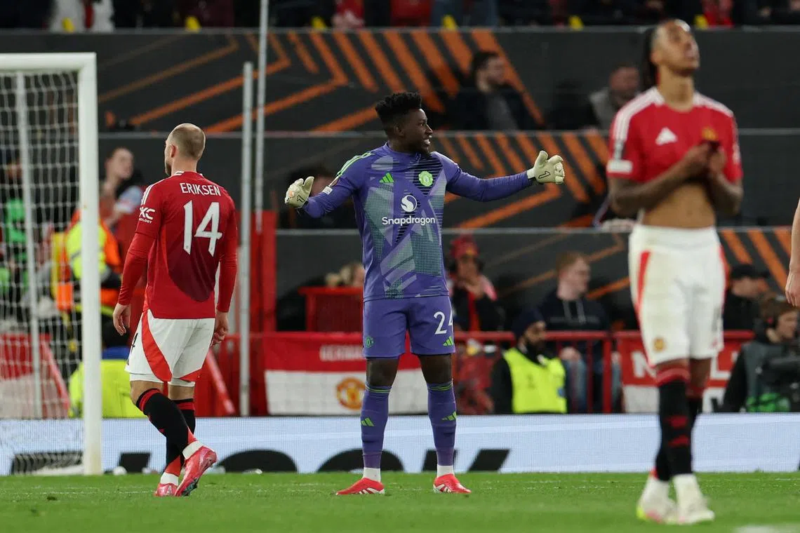 FILE PHOTO: Soccer Football - Europa League - Quarter Final - Second Leg - Manchester United v Olympique Lyonnais - Old Trafford, Manchester, Britain - April 17, 2025, Manchester United's Andre Onana and Manchester United's Christian Eriksen react after Olympique Lyonnais' Rayan Cherki scores their third goal REUTERS/Phil Noble/File Photo