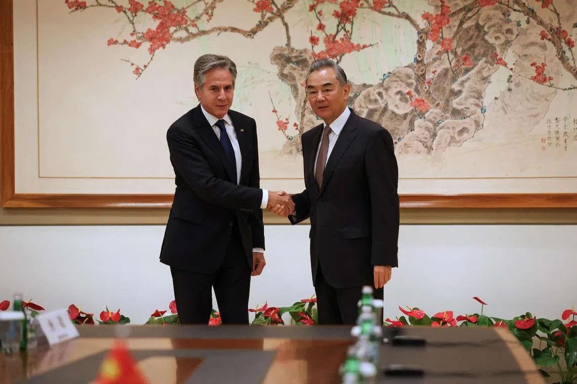 US Secretary of State Antony Blinken (left) and China's Foreign Minister Wang Yi  meeting in New York, on Sept 27.