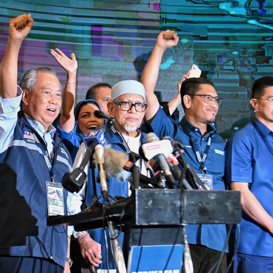 PAS president Abdul Hadi Awang (second from left) says the party will end its ties with Bersatu, while remaining open to electoral cooperation with it.