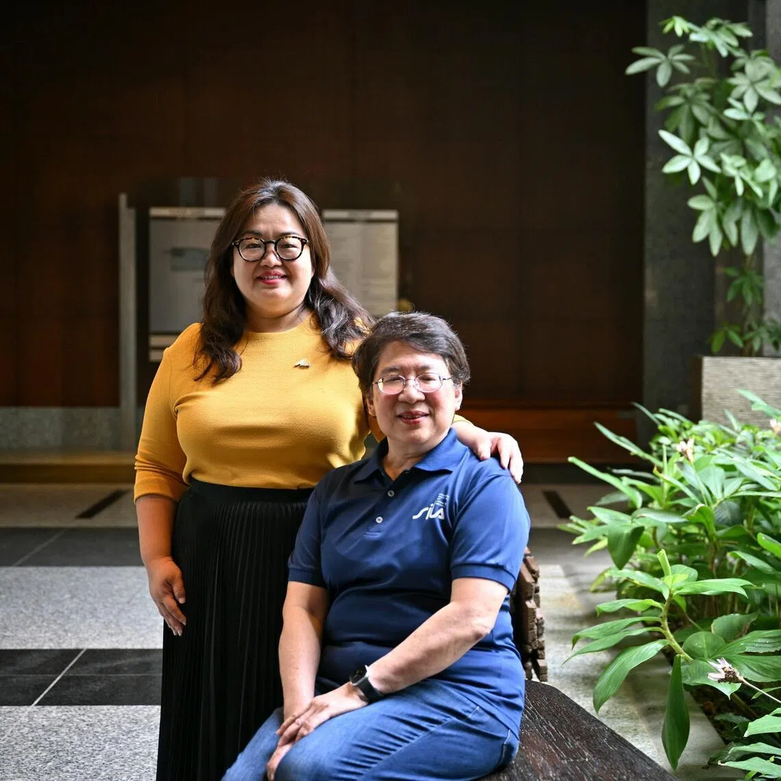 (From left) Yvonne Tan, President of the Singapore Institute of Landscape Architects, and Tay Bee Choo, an industry veteran, at the Singapore Landscape Architecture Exhibition at The URA Centre, on Mar 16, 2026.