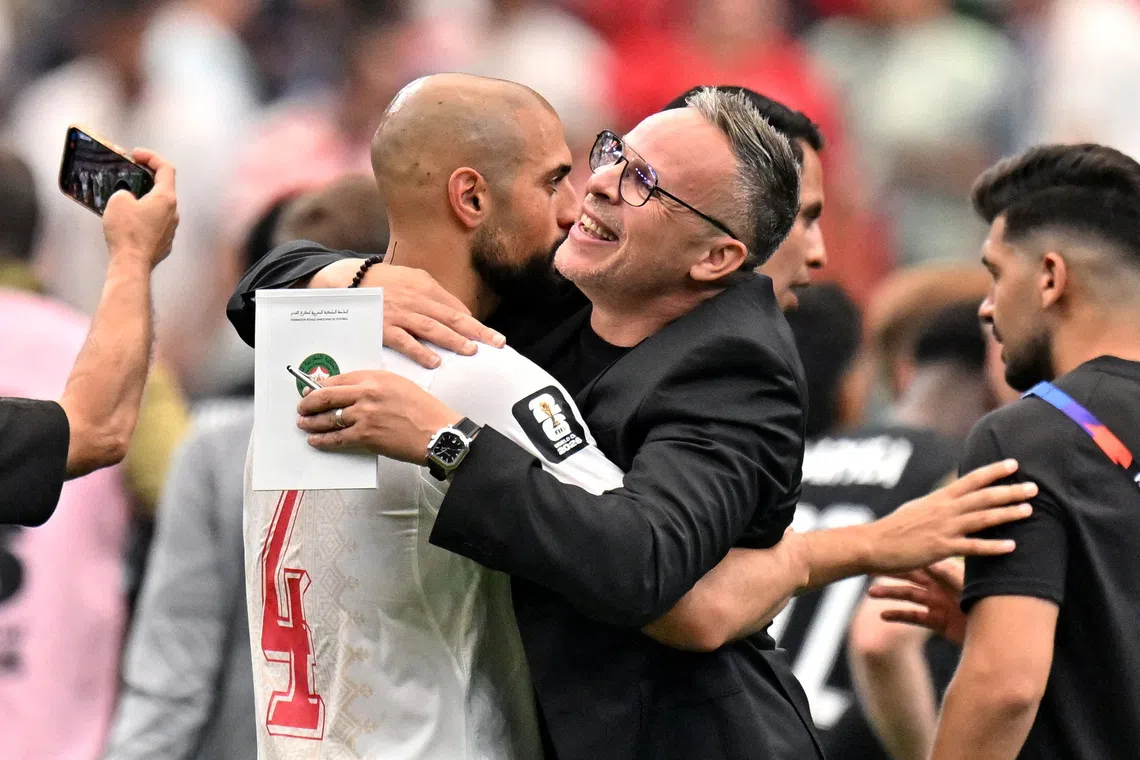 FILE PHOTO: Soccer Football - FIFA World Cup 2026 - Round of 16 - Canada v Morocco - Houston Stadium, Houston, Texas, U.S. - July 4, 2026 Morocco's Sofyan Amrabat and Morocco coach Mohamed Ouahbi celebrate after the match IMAGN IMAGES via Reuters/Maria Lysaker/File Photo