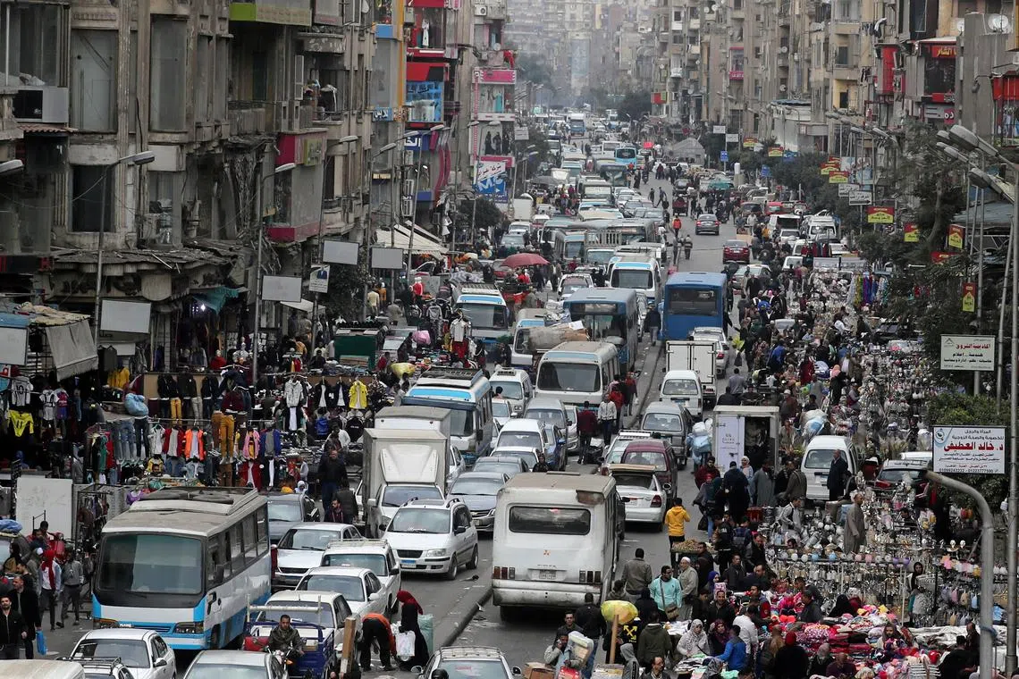 FILE PHOTO: A general view shows a crowd and shops at Al Ataba, a market in central Cairo, Egypt February 10, 2020. REUTERS/Mohamed Abd El Ghany/File Photo