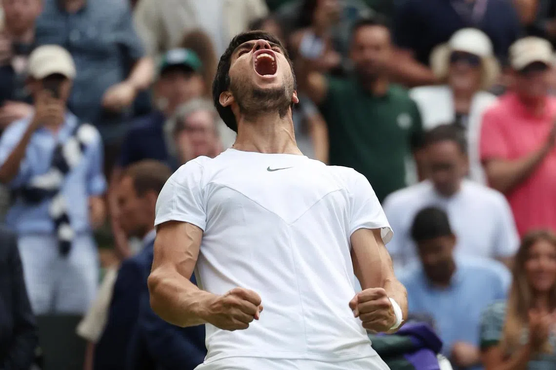Spain's Carlos Alcaraz celebrates his win over childhood pal Holger Rune, of Denmark.