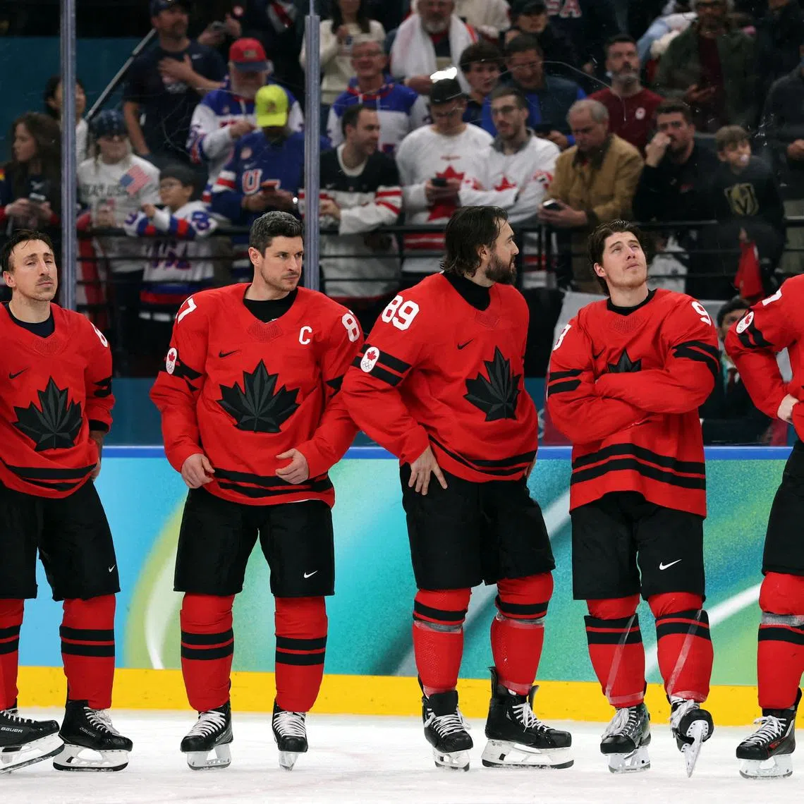 Milano Cortina 2026 Olympics - Ice Hockey - Men's Gold Medal Game - Canada vs United States - Milano Santagiulia Ice Hockey Arena, Milan, Italy - February 22, 2026. Canada players look dejected after Jack Hughes of United States scores their second goal in overtime to win gold REUTERS/Mike Segar     TPX IMAGES OF THE DAY