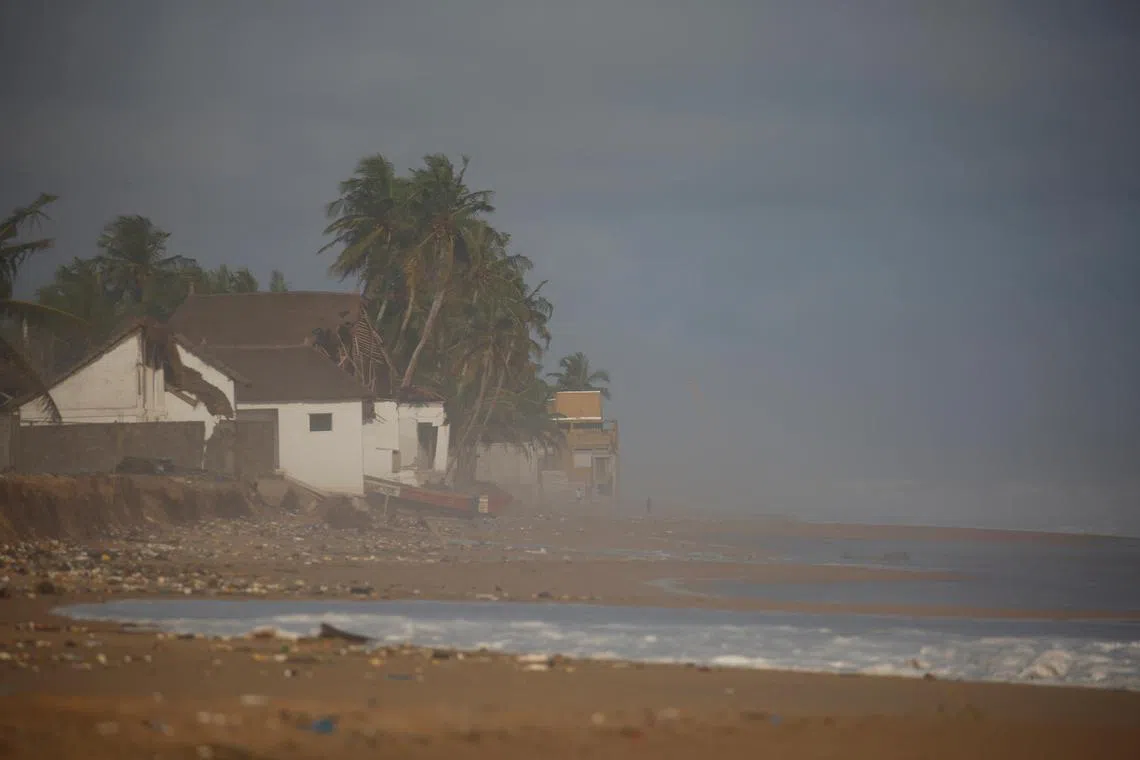 A sea storm impacts the ruins of a hotel, recently abandoned after being destroyed by a sudden rise in water which damaged several hotels and houses on the coastal towns east of Abidjan in August, in Grand Bassam, Ivory Coast September 20, 2023.REUTERS/Luc Gnago