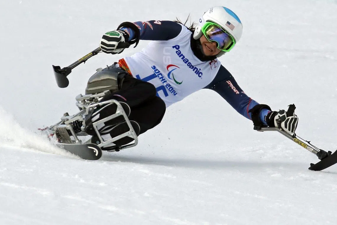 FILE PHOTO: U.S. Alana Nichols skis during the Women's Downhill Sitting training at the 2014 Sochi Paralympic Winter Games at the Rosa Khutor Alpine Center, March 6, 2014.  REUTERS/Christian Hartmann/File Photo