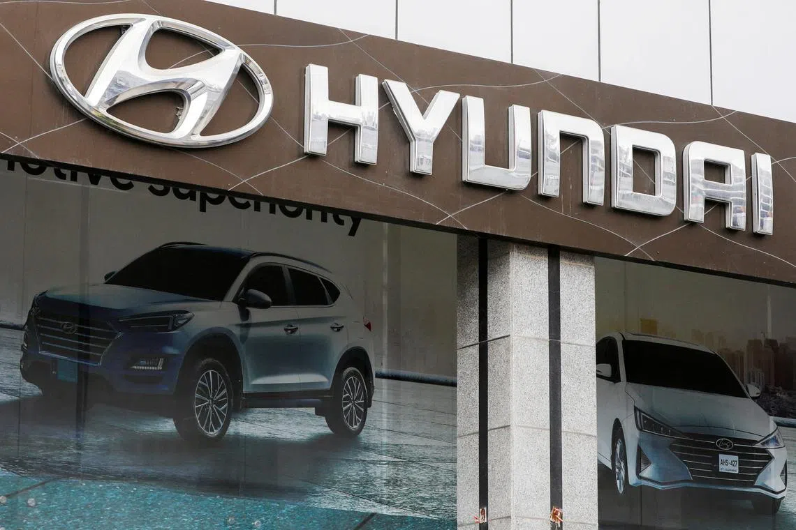 FILE PHOTO: Hyundai logo is seen at a Hyundai City Store, a company operated outlet, in Karachi, Pakistan, February 8, 2022. REUTERS/Akhtar Soomro