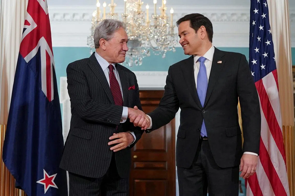 FILE PHOTO: U.S. Secretary of State Marco Rubio and New Zealand Deputy Prime Minister and Foreign Minister Winston Peters shake hands on the day of a meeting at the State Department in Washington, D.C., U.S., March 18, 2025. REUTERS/Nathan Howard/File Photo