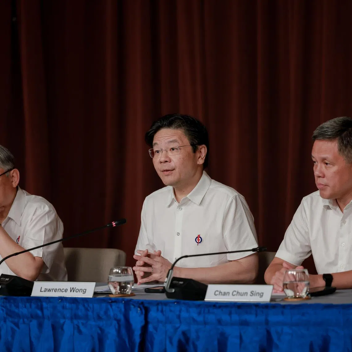 (From left) Deputy Prime Minister Gan Kim Yong, Prime Minister Lawrence Wong and Education Minister Chan Chun Sing at the media conference on May 4.
