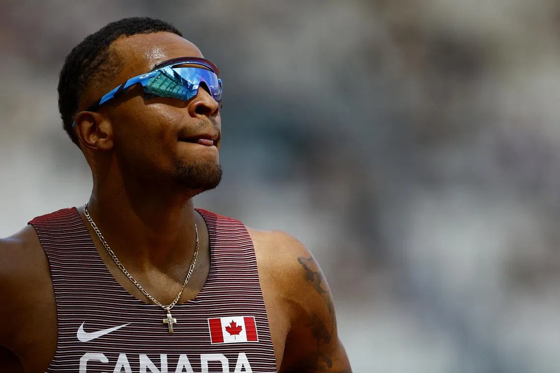 FILE PHOTO: Athletics - World Athletics Championship - Men's 200m - National Athletics Centre, Budapest, Hungary - August 23, 2023  Canada's Andre De Grasse during heat 6 REUTERS/Sarah Meyssonnier/File Photo