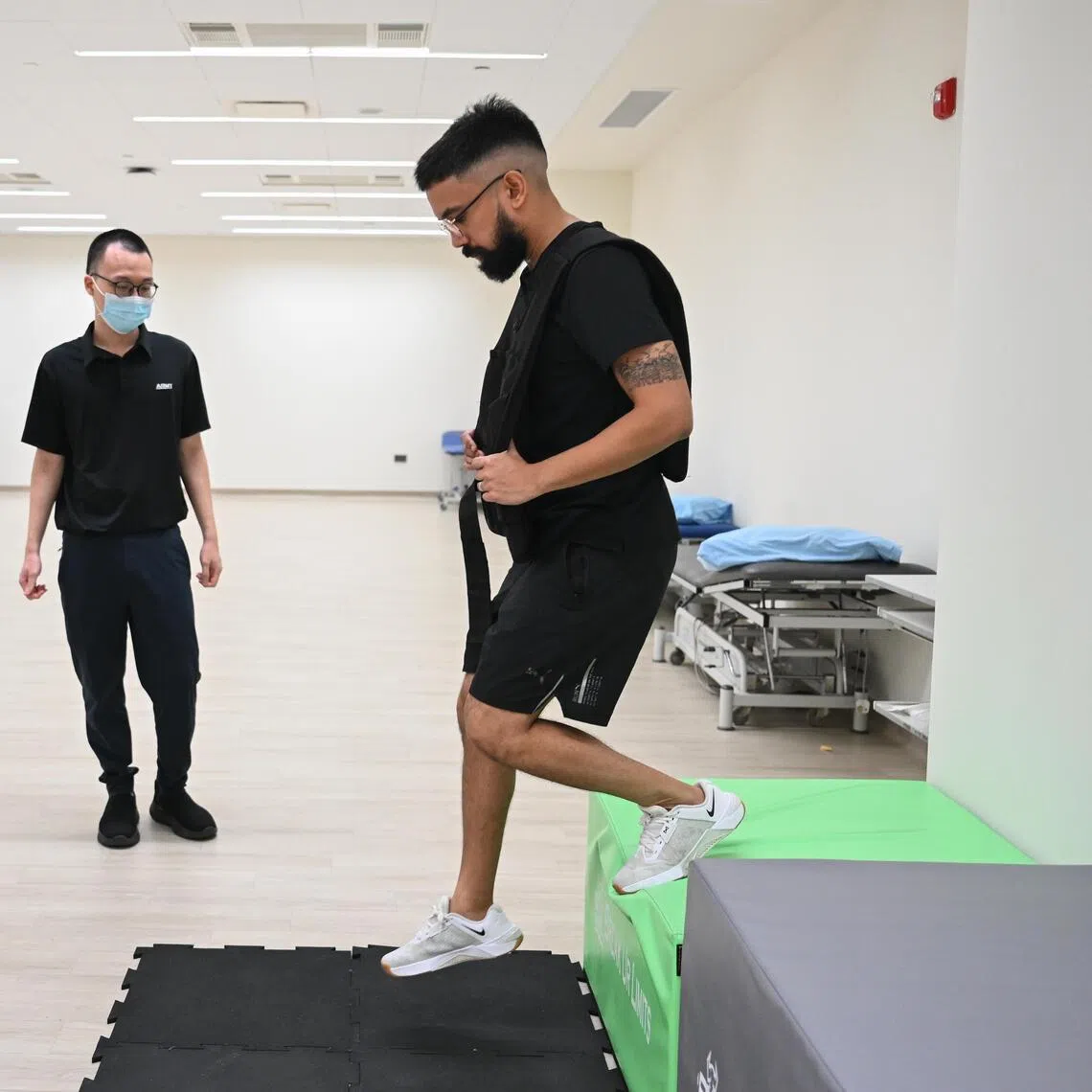 ST correspondent Samuel Devaraj undergoing a landing from height test, as part of the functional test which selected pre-enlistees undergo to assess their ability to carry out specific tasks.