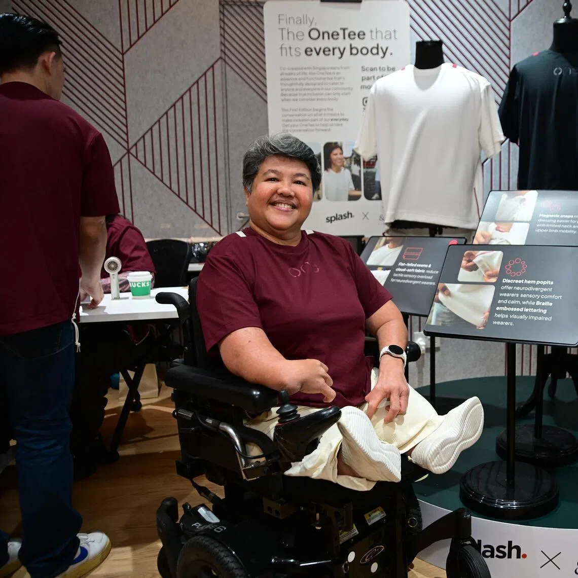 Ms Judy Wee, the executive director of the Muscular Dystrophy Association of Singapore, likes the OneTee's features such as its side zippers which allows the shirt length to be adjusted for wheelchair users.