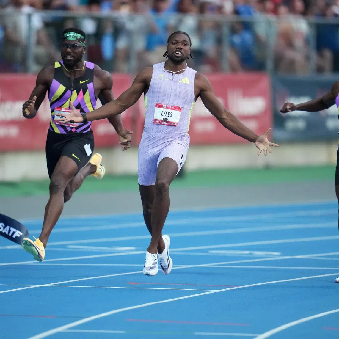Jul 24, 2026; New York, NY, USA; Noah Lyles (center) defeats Kenny Bednarek (left) and Christian Coleman to win the 100m in 9.79 during the USATF Championships at Icahn Stadium. Mandatory Credit: Kirby Lee-Imagn Images