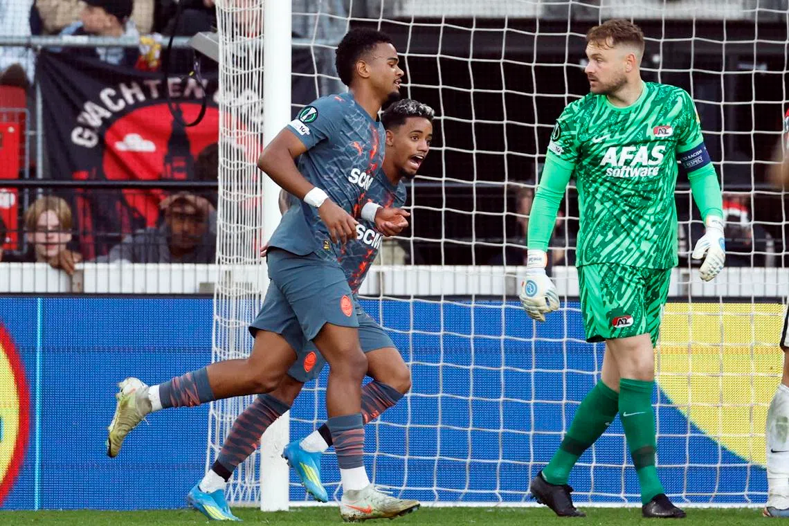 Soccer Football - UEFA Conference League - Quarter Final - Second Leg - AZ Alkmaar v Shakhtar Donetsk - AFAS Stadion, Alkmaar, Netherlands - April 16, 2026 Shakhtar Donetsk's Alisson Santana celebrates scoring their first goal with Newertton REUTERS/Maurice Van Steen