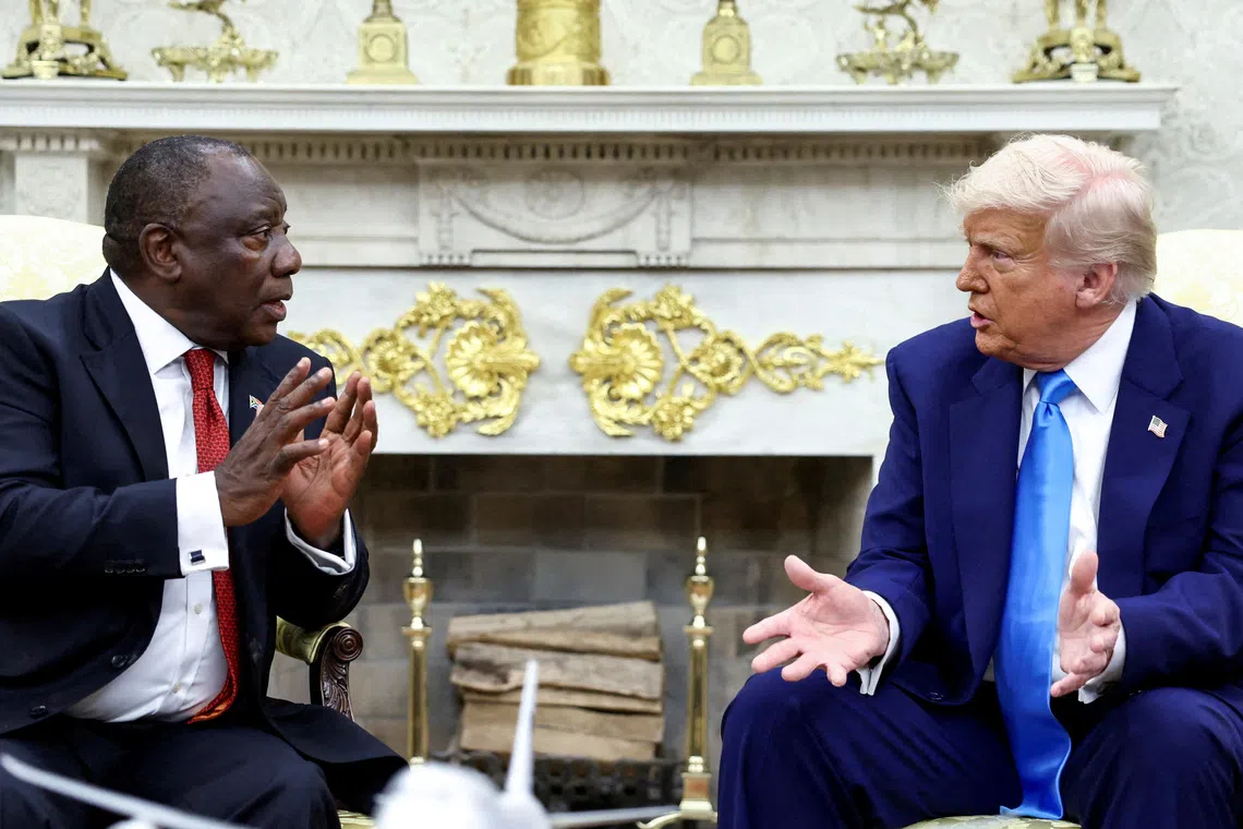 FILE PHOTO: U.S. President Donald Trump meets South African President Cyril Ramaphosa in the Oval Office of the White House in Washington, D.C., U.S., May 21, 2025. REUTERS/Kevin Lamarque/File Photo
