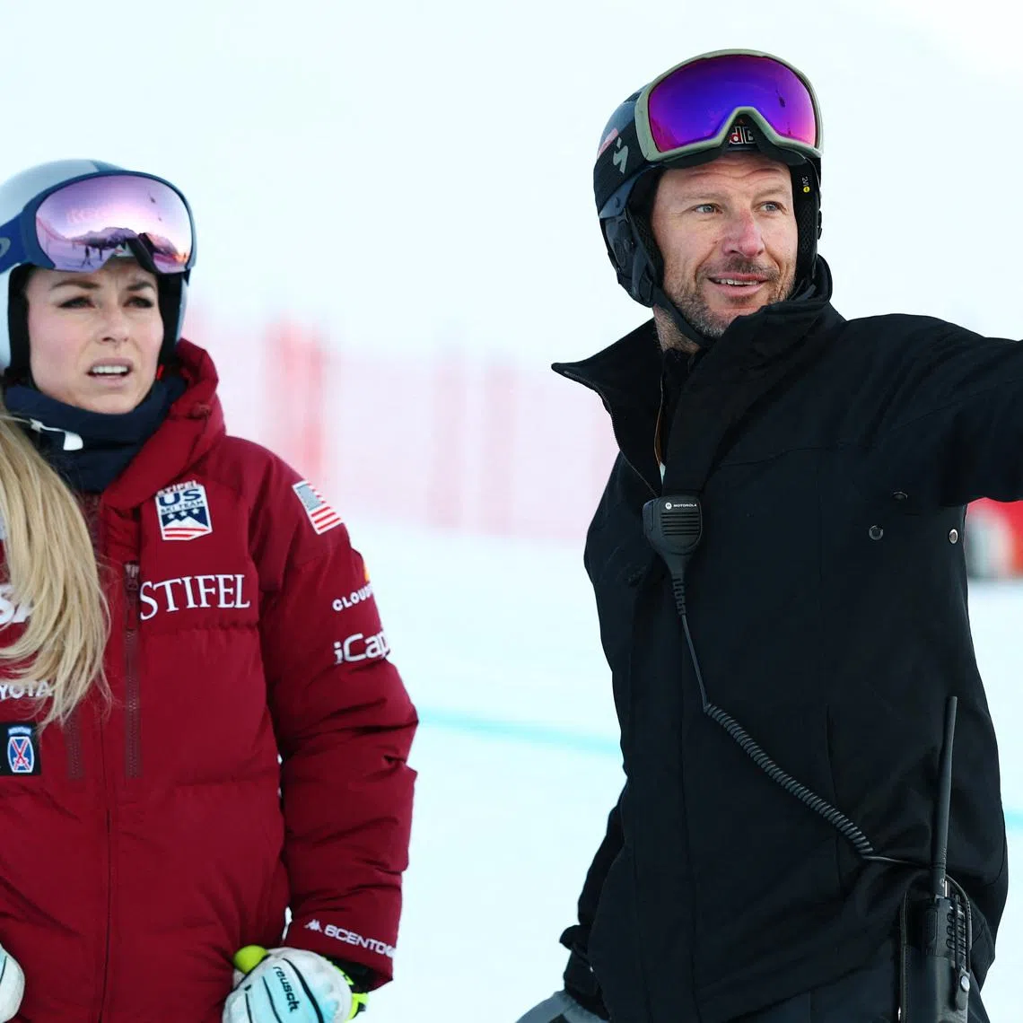 Alpine Skiing - FIS Alpine Ski World Cup - Women's Super G - St. Moritz, Switzerland - December 14, 2025 Lindsey Vonn of the U.S. with coach Aksel Lund Svindal during practice before the Women's Super G REUTERS/Denis Balibouse