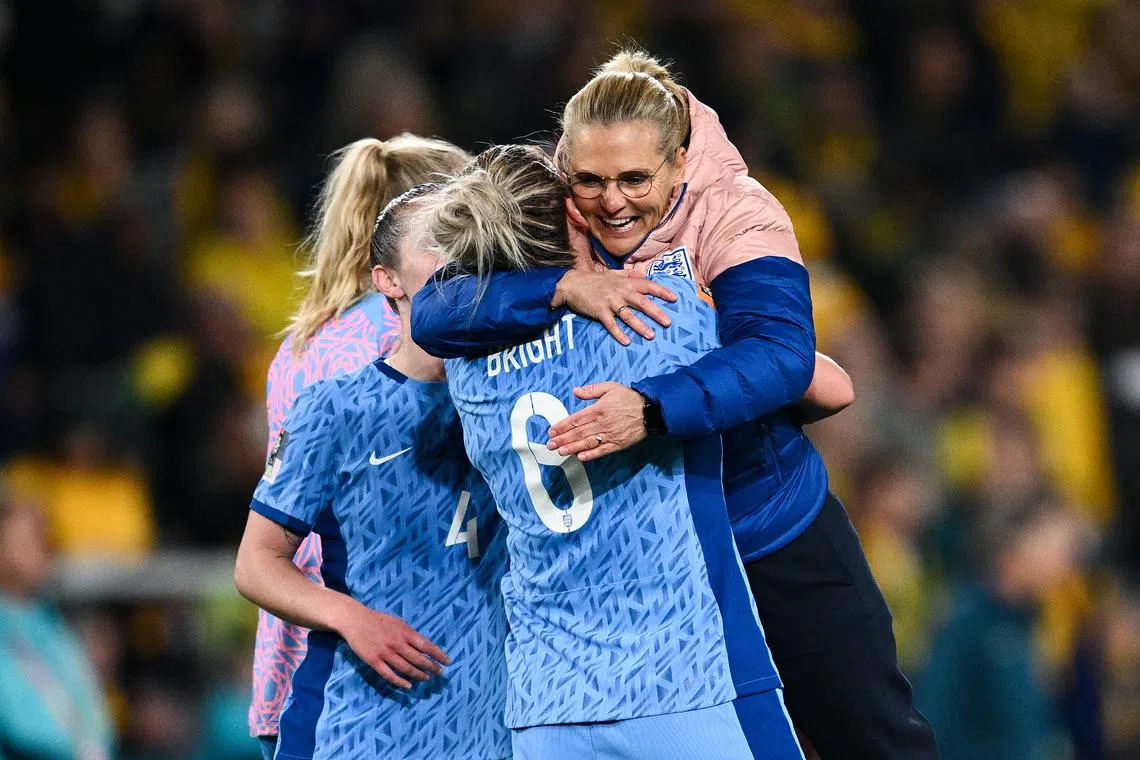 England’s head coach Sarina Wiegman (right) celebrating with Millie Bright after their World Cup match against Australia on Aug 16. 